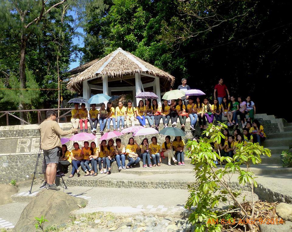 Young people participating in a community environmental activity